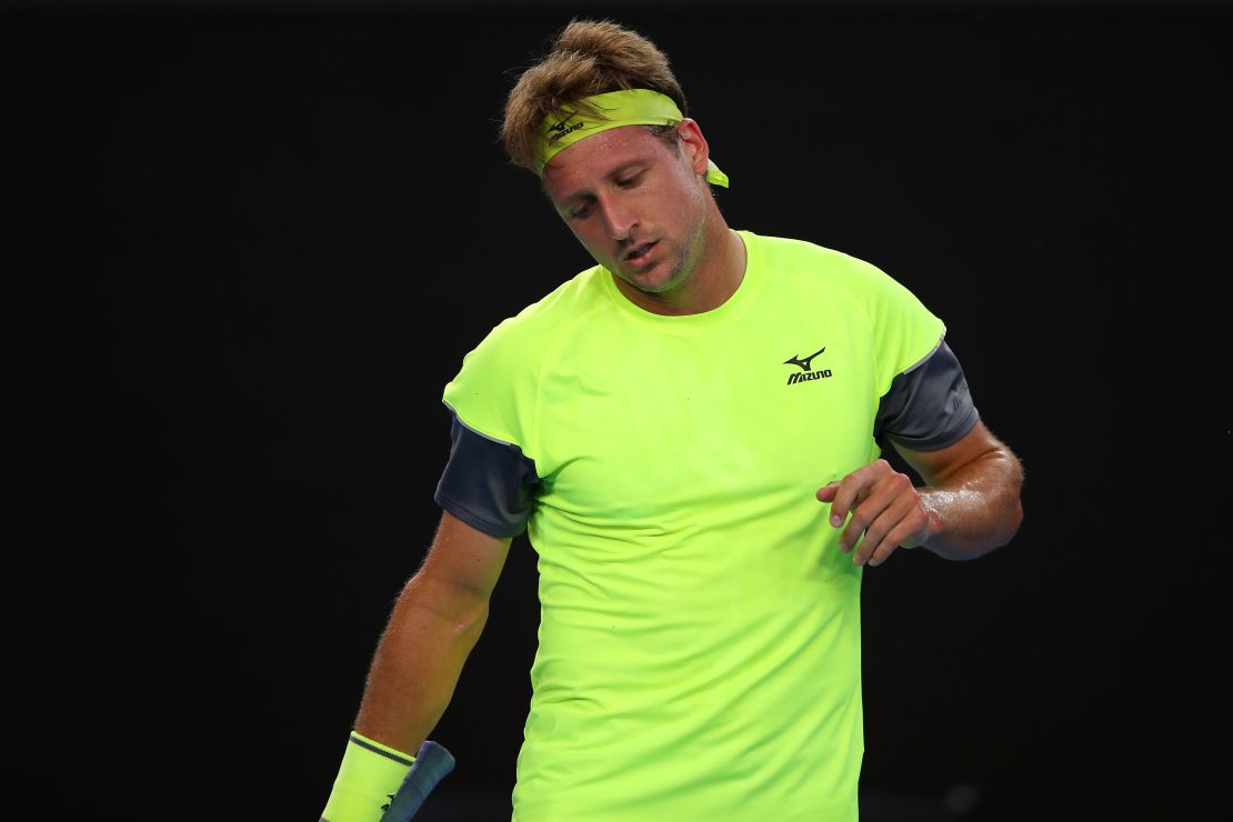 Tennys Sandgren reacts in Melbourne after hitting a shot. 