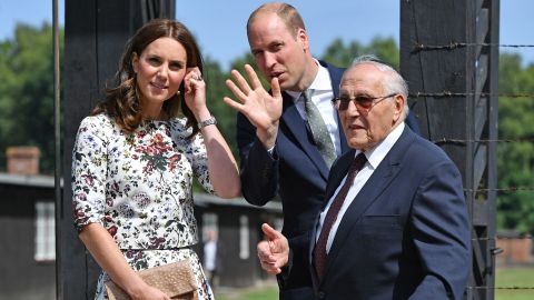 Catherine, Duchess of Cambridge (L), and Prince William, Duke of Cambridge, meet Manfred Goldberg as they visit the former Stutthof Nazi concentration camp during an official visit to Poland.