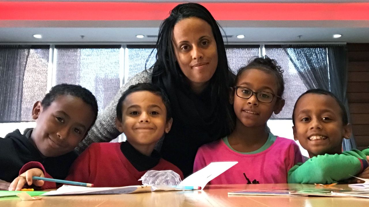 Milagros Bosse with her four children (from left): Tron, Julian, Taina and Terence. 