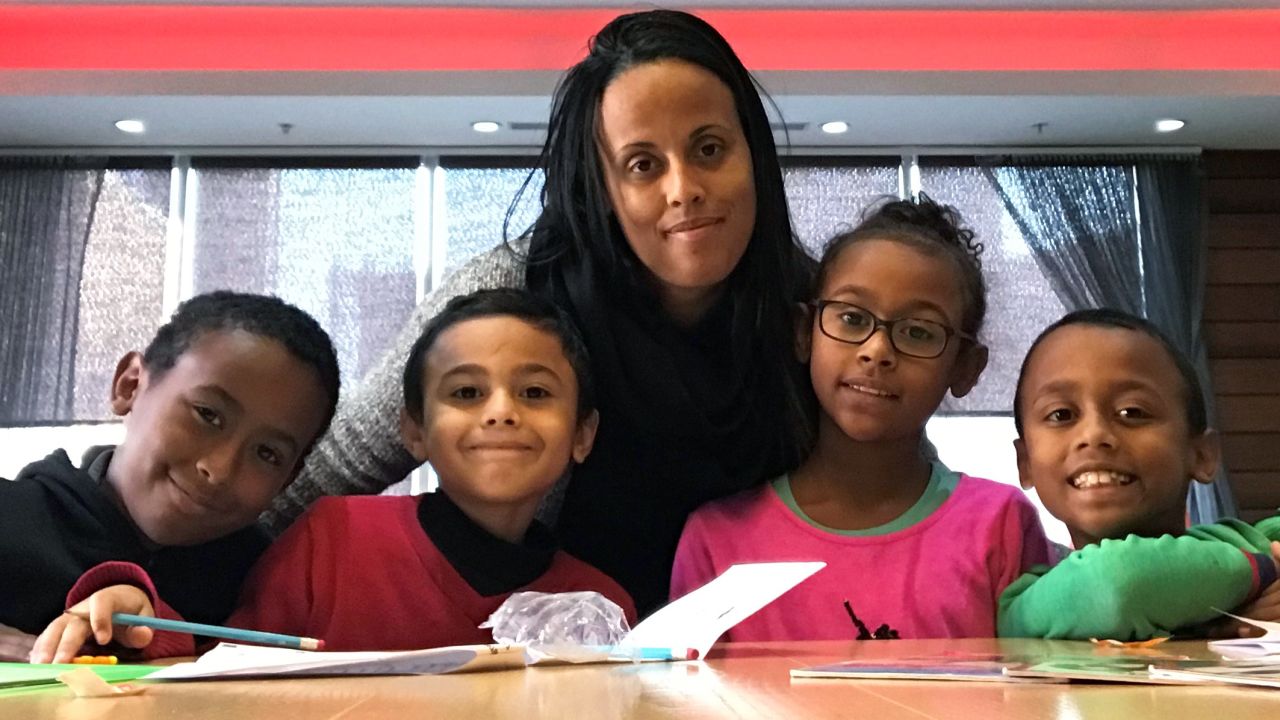 Milagros Bosse with her four children (from left): Tron, Julian, Taina and Terence.