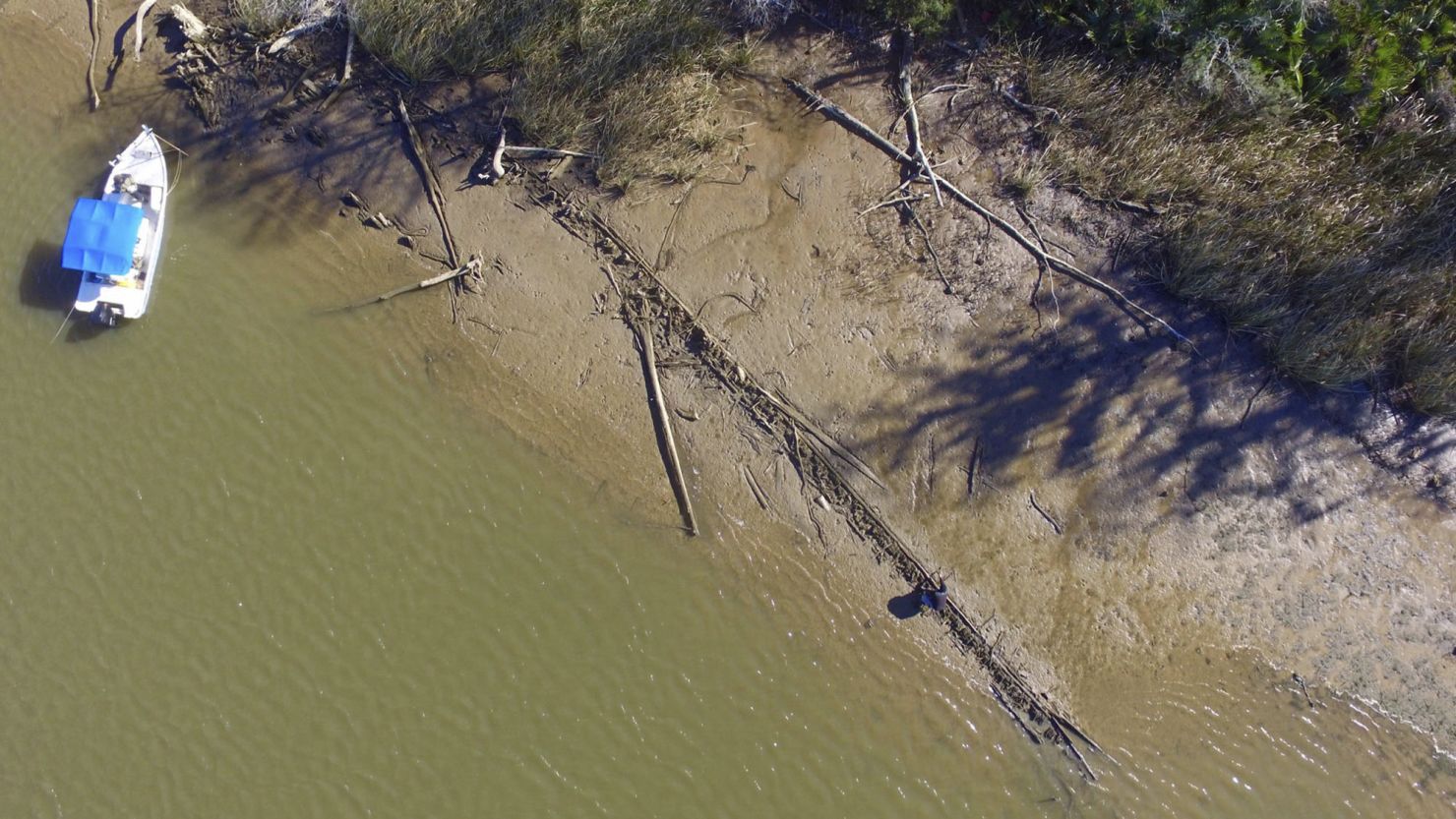 This aerial photo shows the remains of what may be the Clotilda, the last slave ship documented to have delivered captive Africans to the United States. The long spine is the ship's starboard side.