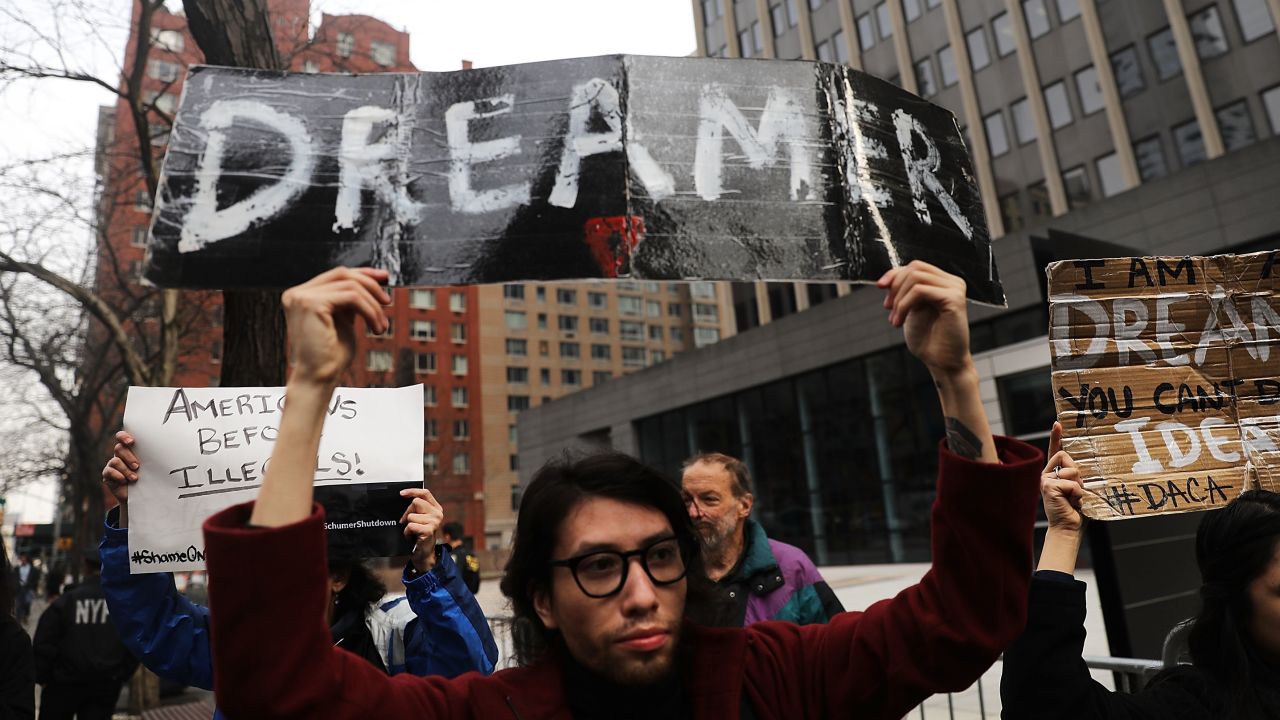 NEW YORK, NY - JANUARY 22: Demonstrators, many of them recent immigrants to America, protest the government shutdown and the lack of a deal on DACA (Deferred Action for Childhood Arrivals) outside of Federal Plaza on January 22, 2018 in New York City. As the Trump administration continues to focus their attention on deportations and the building of a new wall along the Mexican and American border, Immigration and Customs Enforcement (ICE) arrests are up. From late January through August 2017, arrests by ICE were up more than 43 percent since the same period in 2016. (Photo by Spencer Platt/Getty Images)