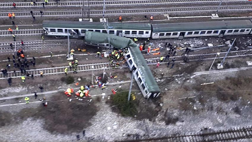 An aerial view shows a derailed train at the station of Pioltello Limito, on the outskirts of Milan, Italy, Thursday, Jan. 25, 2018. Carabinieri say a commuter train carrying hundreds of people has derailed in northern Italy, killing at least two people and seriously injuring at least 10. (Italian Firefighters Vigili del Fuoco via AP)