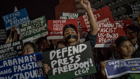 Journalists and activists stage a protest calling to defend press freedom on January 19, 2018, in Quezon City, Metro Manila, Philippines following the SEC decision to withdraw Rappler's license.
