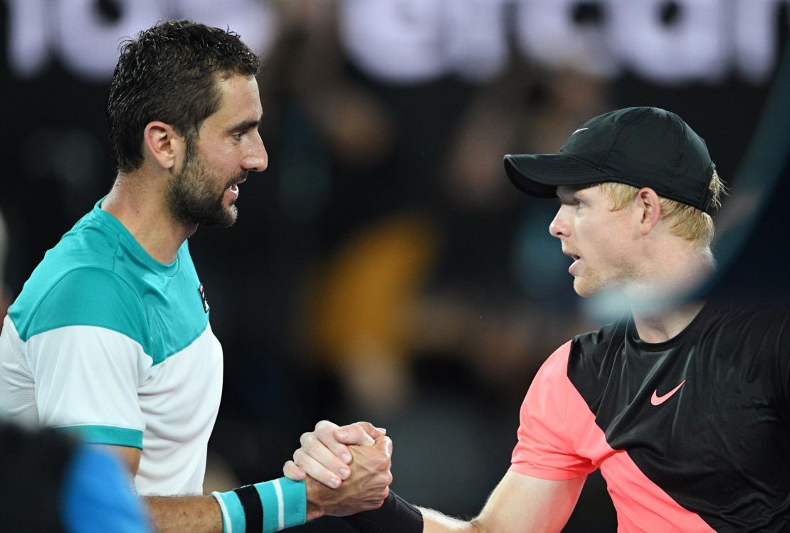 Cilic (left) eased past Edmund to make his first Australian Open final.