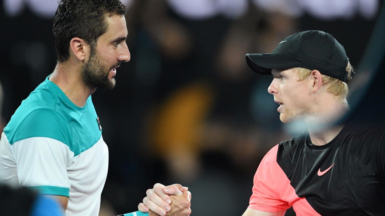 Cilic (left) eased past Edmund to make his first Australian Open final.