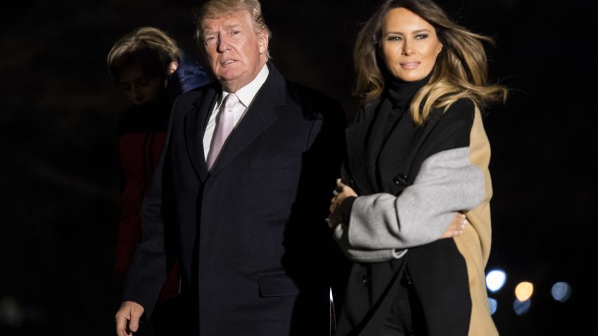 WASHINGTON, DC - JANUARY 15: President Donald Trump and First Lady Melania Trump return to the White House following a weekend trip to Mar-a-Lago, on the South Lawn of the White House on January 15, 2018 in Washington, D.C. (Photo by Kevin Dietsch-Pool/Getty Images)