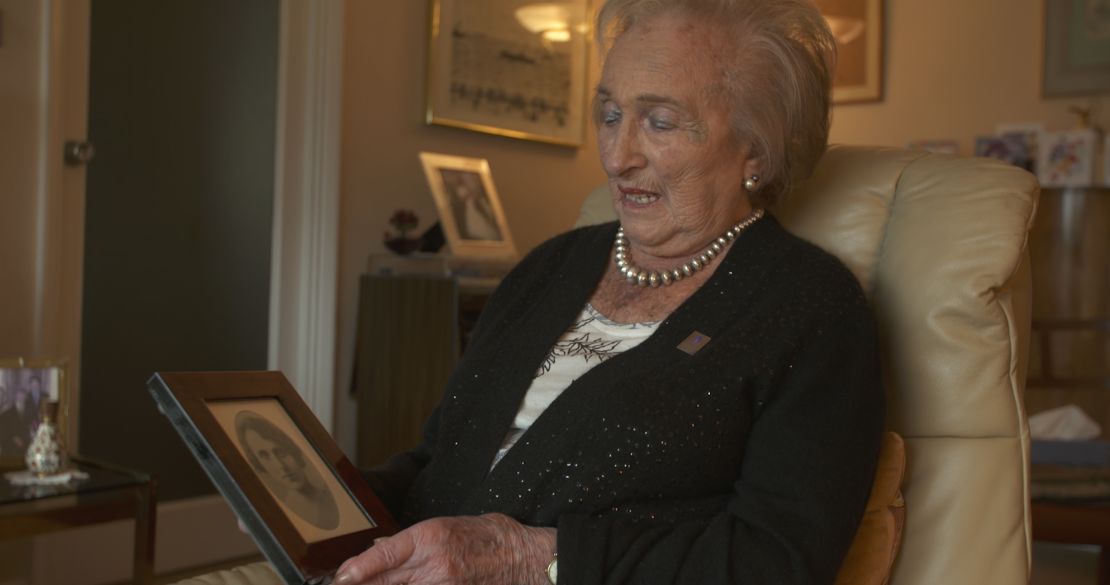 Freda Wineman looks at a photo of her mother who was killed at Auschwitz.