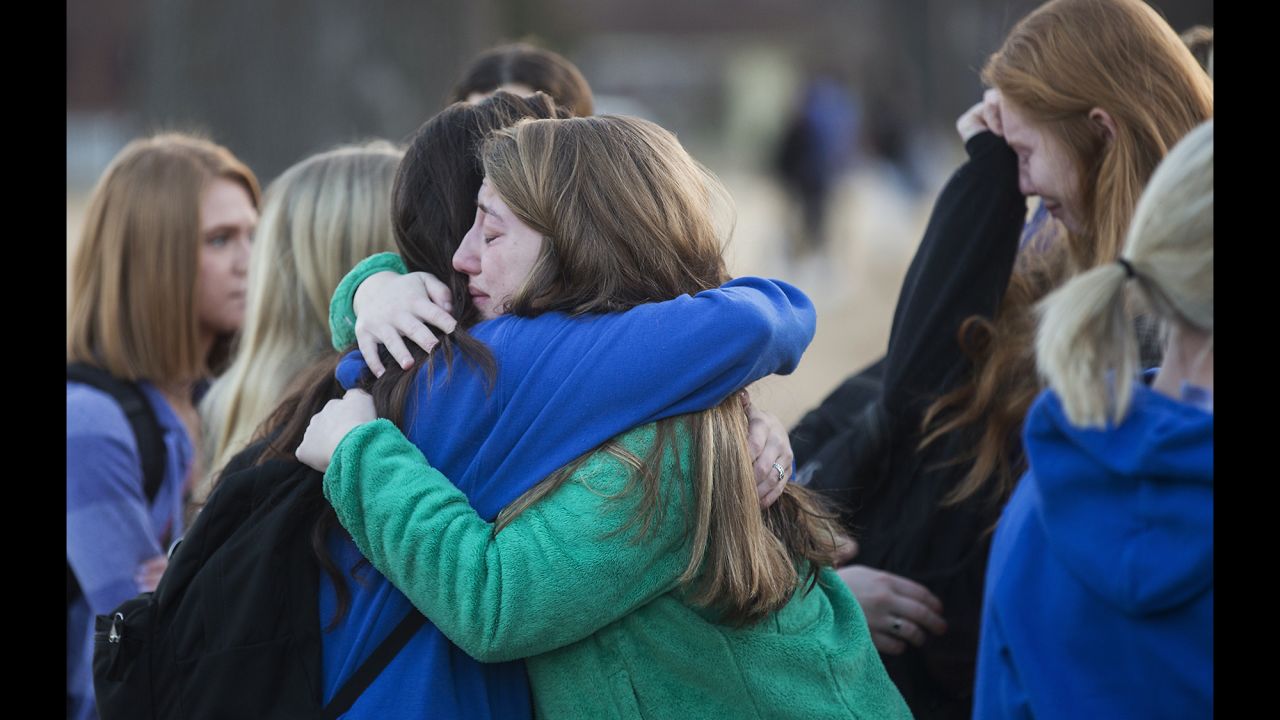 Students embrace following a prayer vigil in Paducah, Kentucky, on Wednesday, January 24, one day after a <a href="http://www.cnn.com/2018/01/23/us/kentucky-high-school-shooting/index.html" target="_blank">mass shooting at Marshall County High School</a> in Benton, Kentucky. Sixteen people were wounded, <a href="http://www.cnn.com/2018/01/25/us/kentucky-school-shooting/index.html" target="_blank">two of them fatally</a>, authorities said. Four others sustained various injuries. The 15-year-old suspect -- who has been charged with two counts of murder and 12 counts of first-degree assault -- made his first court appearance on Thursday morning, Marshall County Assistant Attorney Jason Darnall said.