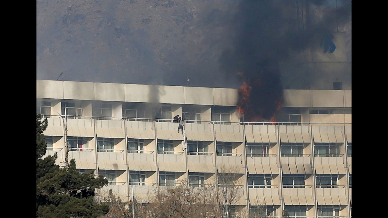 A man tries to escape from a balcony at Kabul's Intercontinental Hotel during an attack in Kabul, Afghanistan, on Sunday, January 21. Gunmen who raided the hotel <a href="http://www.cnn.com/2018/01/21/asia/intercontinental-hotel-kabul-siege/index.html" target="_blank">killed at least 18 people during a 12-hour standoff</a> with security forces, Afghan authorities said.