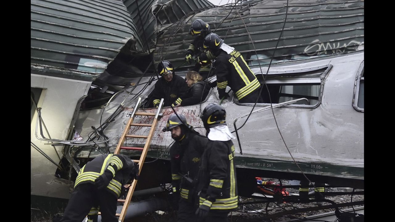 Firefighters help a woman out of a derailed train at Pioltello-Limito station on the outskirts of Milan, Italy, on Thursday, January 25. <a href="http://www.cnn.com/2018/01/25/europe/milan-train-derailment-italy-intl/index.html" target="_blank">At least three people were killed and dozens injured</a> when the train derailed and crashed, the Italian fire department said. The train's operator, Trenord, said in a tweet that a "technical problem" caused the accident.