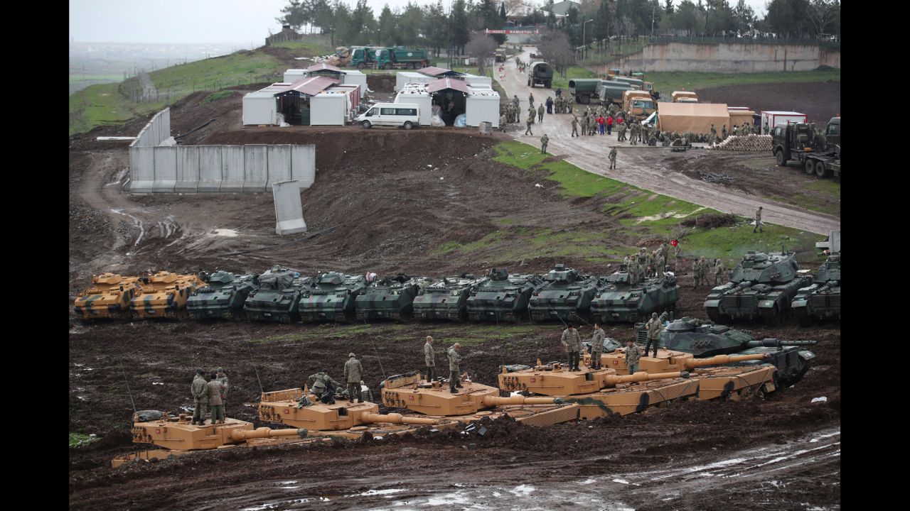 Turkish army tanks and armored personnel carriers (APC) are seen near the Turkish-Syrian border in Hatay province, Turkey, on Tuesday, January 23. <a href="http://www.cnn.com/2018/01/23/middleeast/turkey-syria-afrin-kurds-intl/index.html" target="_blank">Turkey launched an operation</a> targeting Kurdish fighters in Afrin, Syria, days earlier, opening new front lines in the seven-year Syrian civil war, just as ISIS fighters in the country have been all but defeated. <a href="http://www.cnn.com/2018/01/23/middleeast/turkey-syria-endgame-analysis-npw-intl/index.html" target="_blank">Understanding Turkey's endgame in Syria</a>