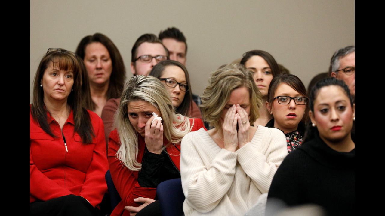People react in the courtroom as Rachael Denhollander, not pictured, speaks during the sentencing hearing of Larry Nassar -- the former osteopathic sports physician with USA Gymnastics and Michigan State University -- in Lansing, Michigan, on Wednesday, January 24. Denhollander, a former gymnast who is credited with helping to shine a light on Nassar's abuse, was the last of <a href="http://www.cnn.com/2018/01/24/us/they-helped-serve-larry-nassar-justice/index.html" target="_blank">more than 150 women and girls to confront Nassar in court</a> during his sentencing hearing. Circuit Court Judge Rosemarie Aquilina <a href="https://www.cnn.com/2018/01/24/us/larry-nassar-sentencing/index.html" target="_blank">sentenced Nassar to 40 to 175 years for his decades of sexual abuse</a>.