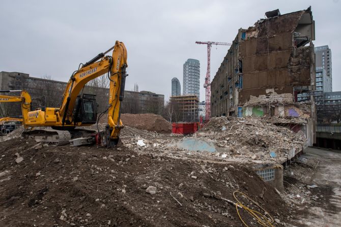 Demoliton continues on the Robin Hood Gardens estate on January 14, 2018 in London, England. The Victoria and Albert Museum has acquired a three story section of Robin Hood Gardens. It is currently in the process of being demolished with more than 1,500 new homes being built in its place.  The Tower Hamlets estate in east London is an example of brutalist architecture and was designed by Alison and Peter Smithson and completed in 1972.