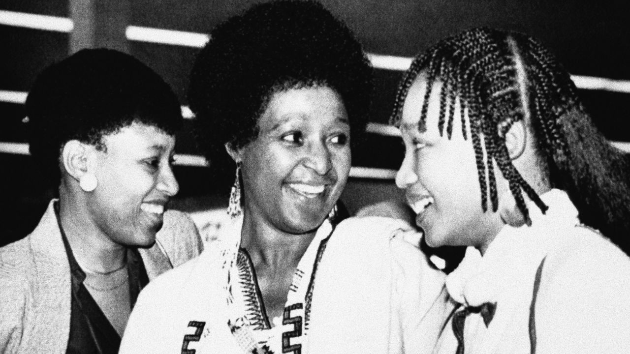 Madikizela-Mandela and her two daughters -- Zenani, left, and Zindzi -- arrive at Cape Town's airport to visit her imprisoned husband in 1985.