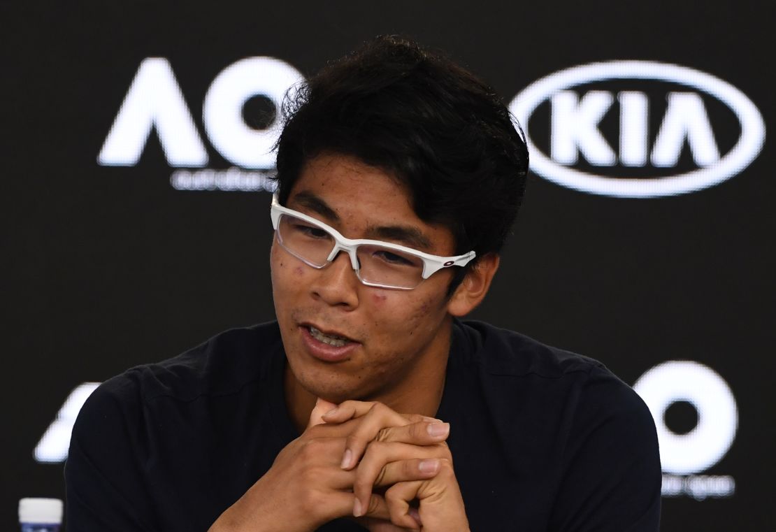 Hyeon Chung speaks to reporters. 