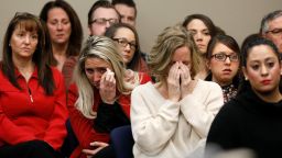 Victims and others look on as Rachael Denhollander speaks at the sentencing hearing for Larry Nassar, a former team USA Gymnastics doctor who pleaded guilty in November 2017 to sexual assault charges, in Lansing, Michigan, U.S., January 24, 2018. REUTERS/Brendan McDermid (Newscom TagID: rtrlnine507952.jpg) [Photo via Newscom]