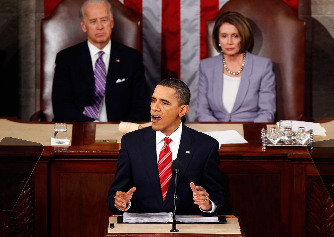 Vice President Joseph Biden and Speaker of the House Rep. Nancy Pelosi look on as President Barack Obama speaks to both houses of Congress during his first State of the Union address on January 27, 2010 in Washington, DC. 