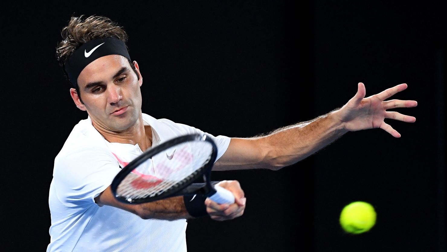 MELBOURNE, AUSTRALIA - JANUARY 26:  Roger Federer of Switzerland plays a forehand in his semi-final match against Hyeon Chung of South Korea on day 12 of the 2018 Australian Open at Melbourne Park on January 26, 2018 in Melbourne, Australia.  (Photo by Quinn Rooney/Getty Images)