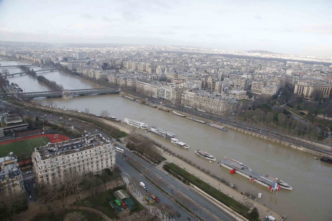 Record rainfall has caused the banks of the Seine river in Paris to overflow, flooding surrounding streets and causing travel disruptions. 