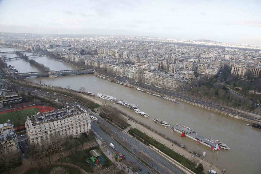 Record rainfall has caused the banks of the Seine river in Paris to overflow, flooding surrounding streets and causing travel disruptions.