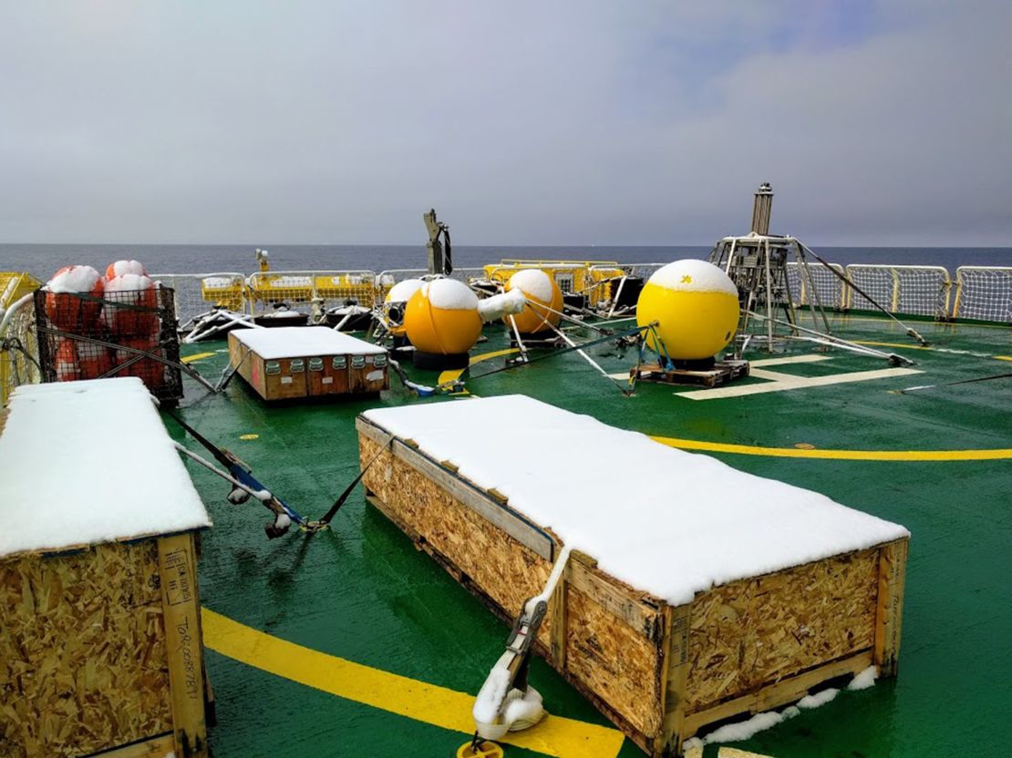Boxes with underwater robots sit on the deck of an icebreaker on its way to Antarctica for research.