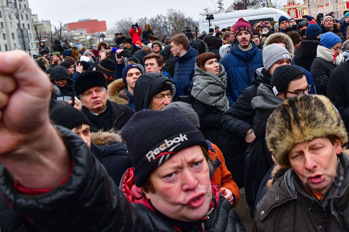 Supporters of Putin's main opponent, Alexei Navalny, call for an election boycott on January 28 in Moscow.