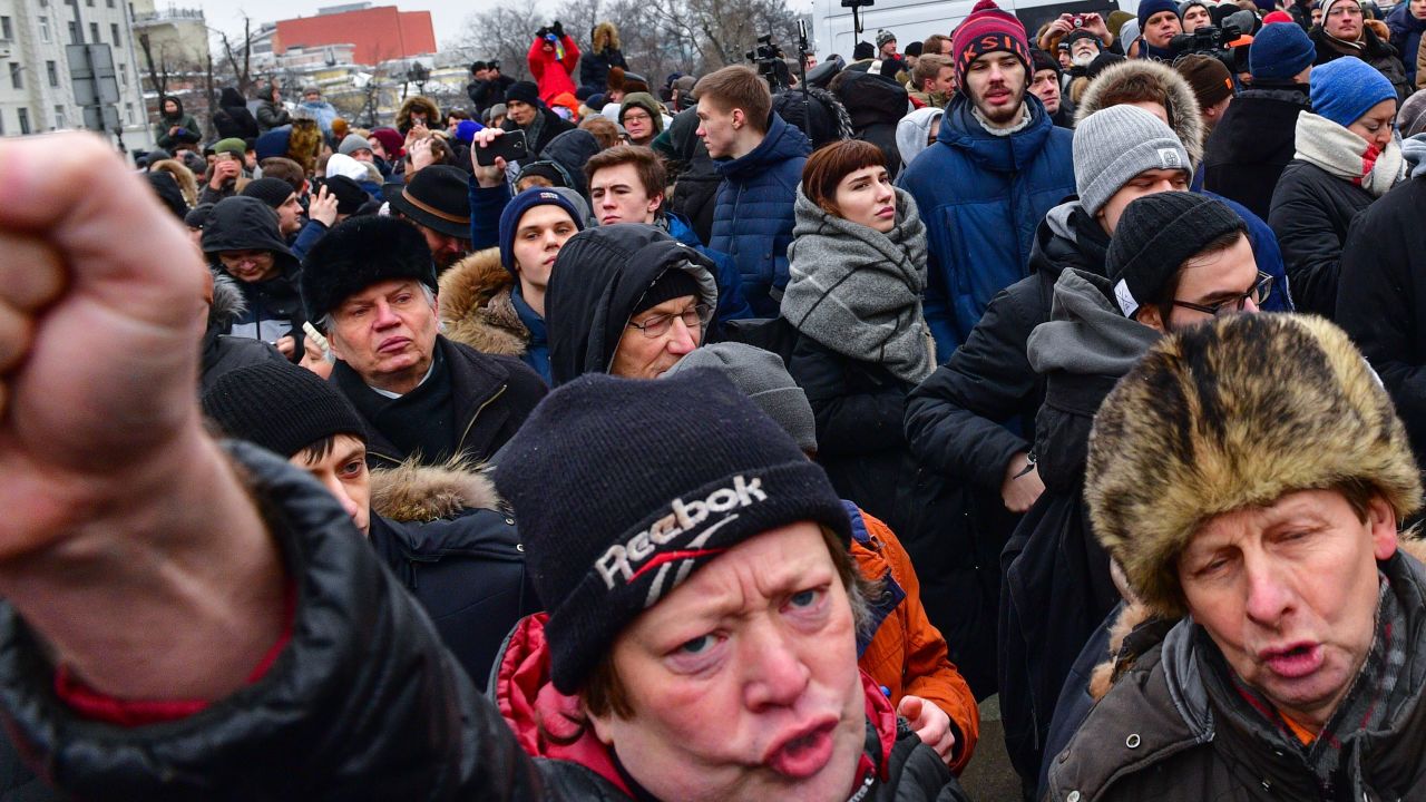 Supporters of Putin's main opponent, Alexei Navalny, call for an election boycott on January 28 in Moscow.