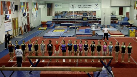 Gymnasts lined up before Martha Karolyi (in the white jacket) after their morning workout at the Karolyi Ranch in January 2011. 