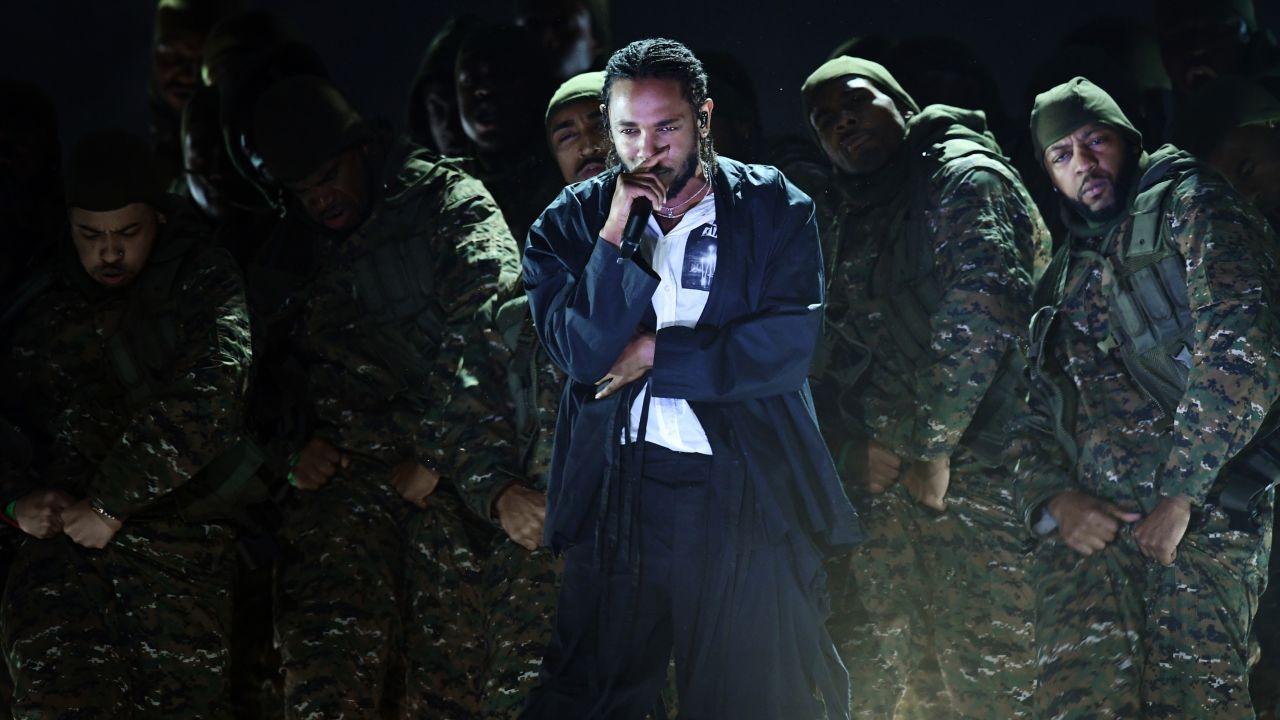 Kendrick Lamar performs at the start of the broadcast. He was nominated for seven Grammys and won five.