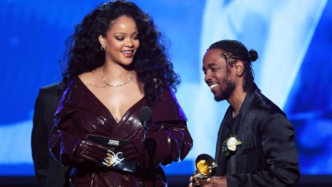 Kendrick Lamar is joined by Rihanna as he accepts the first Grammy of the television broadcast. The two teamed up for "Loyalty," which won the award for best rap/sung performance.