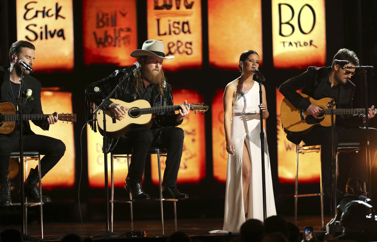 The Brothers Osborne, left, join Maren Morris and Eric Church for a cover of the Eric Clapton classic "Tears in Heaven." The song -- and the stage -- paid tribute to those killed in the Las Vegas shooting last year.
