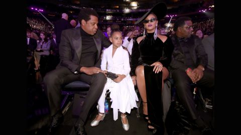 Jay-Z, Beyonce and their daughter Blue Ivy attend the show.