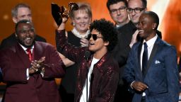 NEW YORK, NY - JANUARY 28:  Recording artist Bruno Mars (C) accepts Album of the Year for '24K Magic' with production team onstage during the 60th Annual GRAMMY Awards at Madison Square Garden on January 28, 2018 in New York City.  (Photo by Kevin Winter/Getty Images for NARAS)