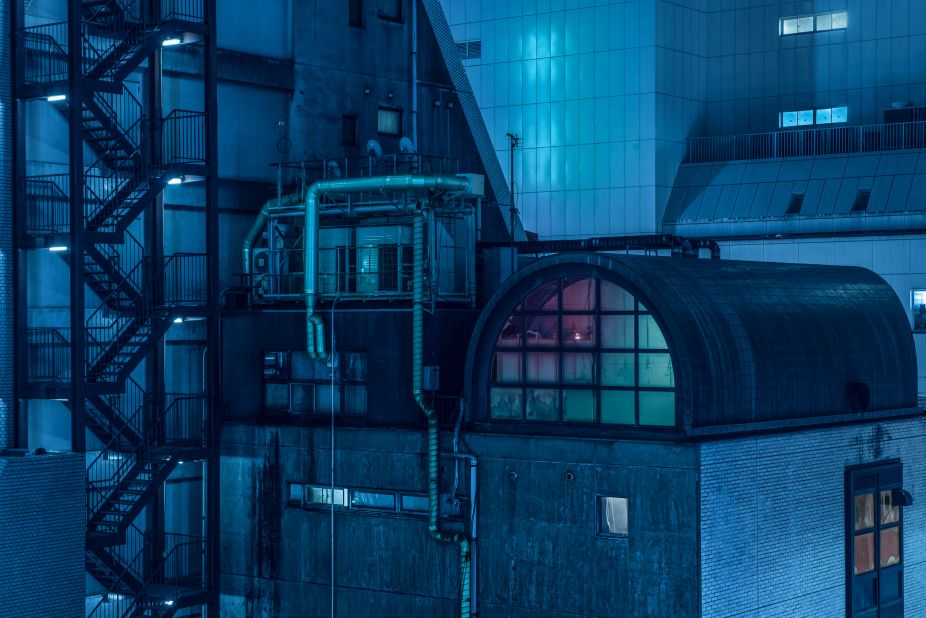 Blachford: "Searching for a rooftop in Shinjuku from which to capture the skyline, I found this small structure. The title refers to the main character of 'Blade Runner,' Tom Deckard, as I imagine he might be living inside this dilapidated pod surrounded by ducting and harsh lights."