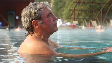 Don Benedict, 70, soaks in warm water fed by hot springs in Idaho City, Idaho. 