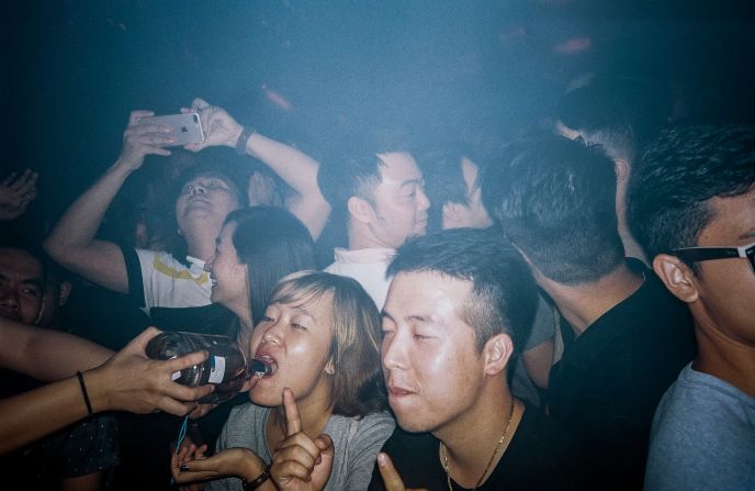 Former news photographer Linh Pham explored nightlife in Vietnam's capital, Hanoi, for his series "Behind Closed Doors."