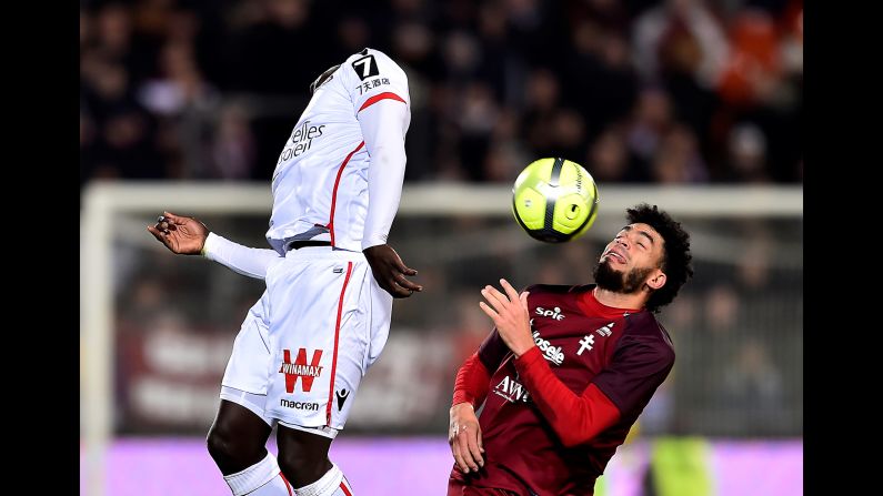 Metz forward Emmanuel Riviere, right, and Nice defender Racine Coly compete for the ball during a French league soccer match on Saturday, January 27.