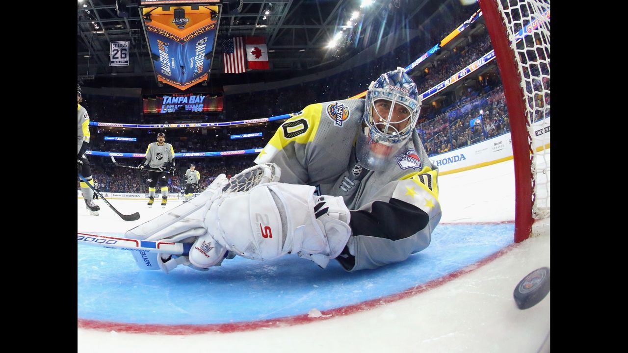 Goalie Henrik Lundqvist watches a puck go behind him during the NHL All-Star Game on Sunday, January 28.