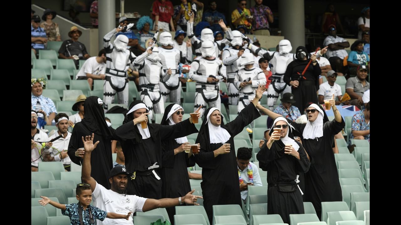 Some rugby fans wear costumes as they take in a Sydney Sevens match between England and Papua New Guinea on Saturday, January 27. 