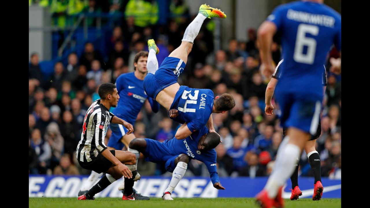 Chelsea defender Gary Cahill collides with teammate N'Golo Kante and goes airborne during an FA Cup match in London on Sunday, January 28.