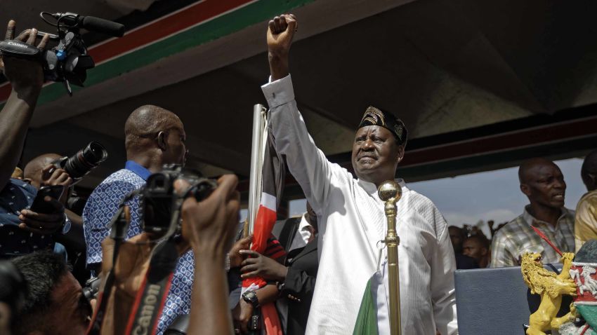 Opposition leader Raila Odinga gestures to his supporters as he arrives for a mock "swearing-in" ceremony at Uhuru Park in downtown Nairobi, Kenya Tuesday, Jan. 30, 2018.