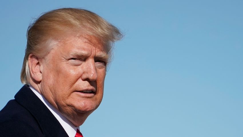 US President Donald Trump makes his way to board Air Force One before departing from Andrews Air Force Base in Maryland on January 18, 2018. 
Trump is heading to Coraopolis, Pennsylvania for a visit. / AFP PHOTO / MANDEL NGAN        (Photo credit should read MANDEL NGAN/AFP/Getty Images)