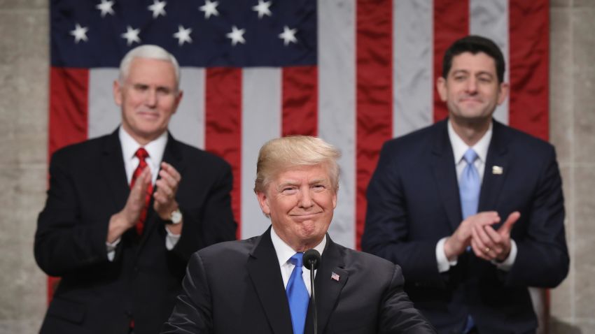 US President Donald Trump smiles after arriving to give the State of the Union address in the chamber of the US House of Representatives in Washington, DC, on January 30, 2018. / AFP PHOTO / POOL / Win McNamee        (Photo credit should read WIN MCNAMEE/AFP/Getty Images)