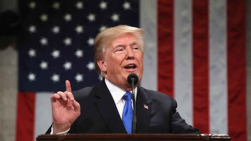 US President Donald  Trump gestures during the State of the Union address in the chamber of the US House of Representatives in Washington, DC, on January 30, 2018. / AFP PHOTO / POOL / Win McNamee        (Photo credit should read WIN MCNAMEE/AFP/Getty Images)