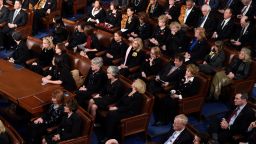 Democratic Senators, House representative, and guests sit and look on as US President Donald Trump delivers the State of the Union address at the US Capitol in Washington, DC, on January 30, 2018. (Photo credit should read SAUL LOEB/AFP/Getty Images)
