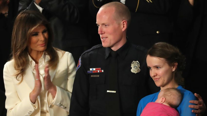 WASHINGTON, DC - JANUARY 30:  First lady Melania Trump claps for Police officer Ryan Holets and his wife during the State of the Union address in the chamber of the U.S. House of Representatives January 30, 2018 in Washington, DC. This is the first State of the Union address given by U.S. President Donald Trump and his second joint-session address to Congress.  (Photo by Chip Somodevilla/Getty Images)