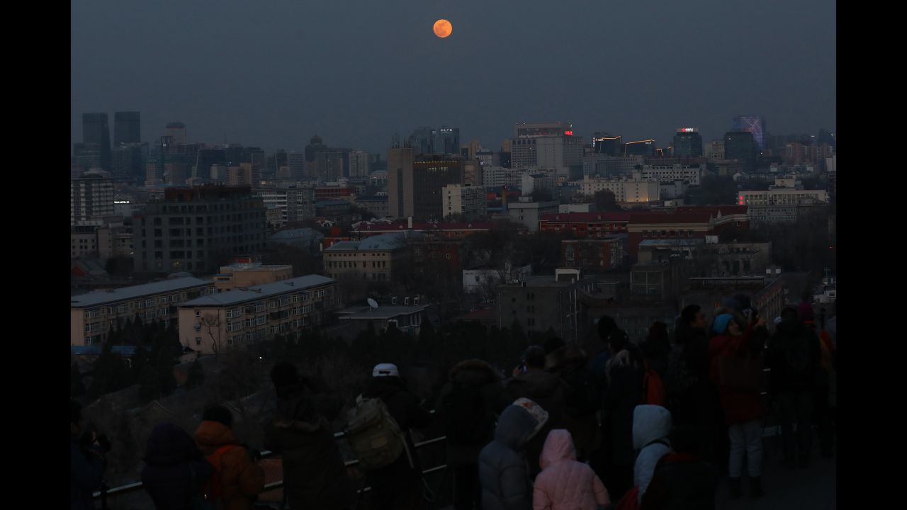 People gather to watch the supermoon in Beijing.