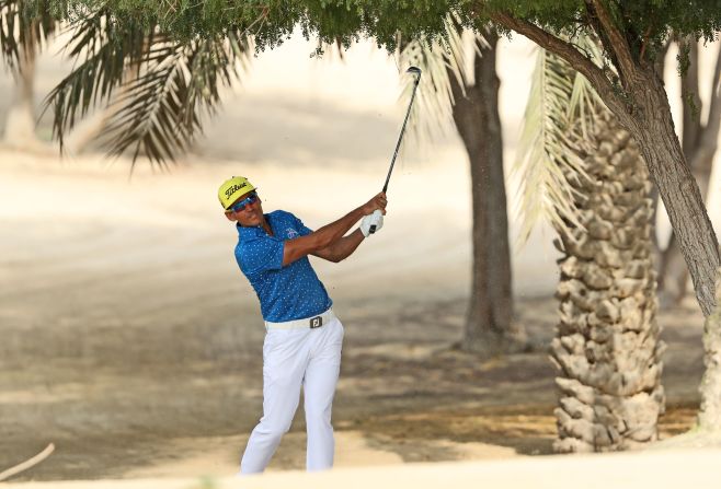 <strong>In the shade: </strong>Spain's Rafa Cabrera Bello hides from the sun sun during January's Dubai Desert Classic. 