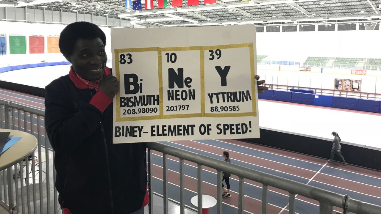 Kweku Biney holds up a sign that speaks to both Maame's love for speed skating and chemistry.